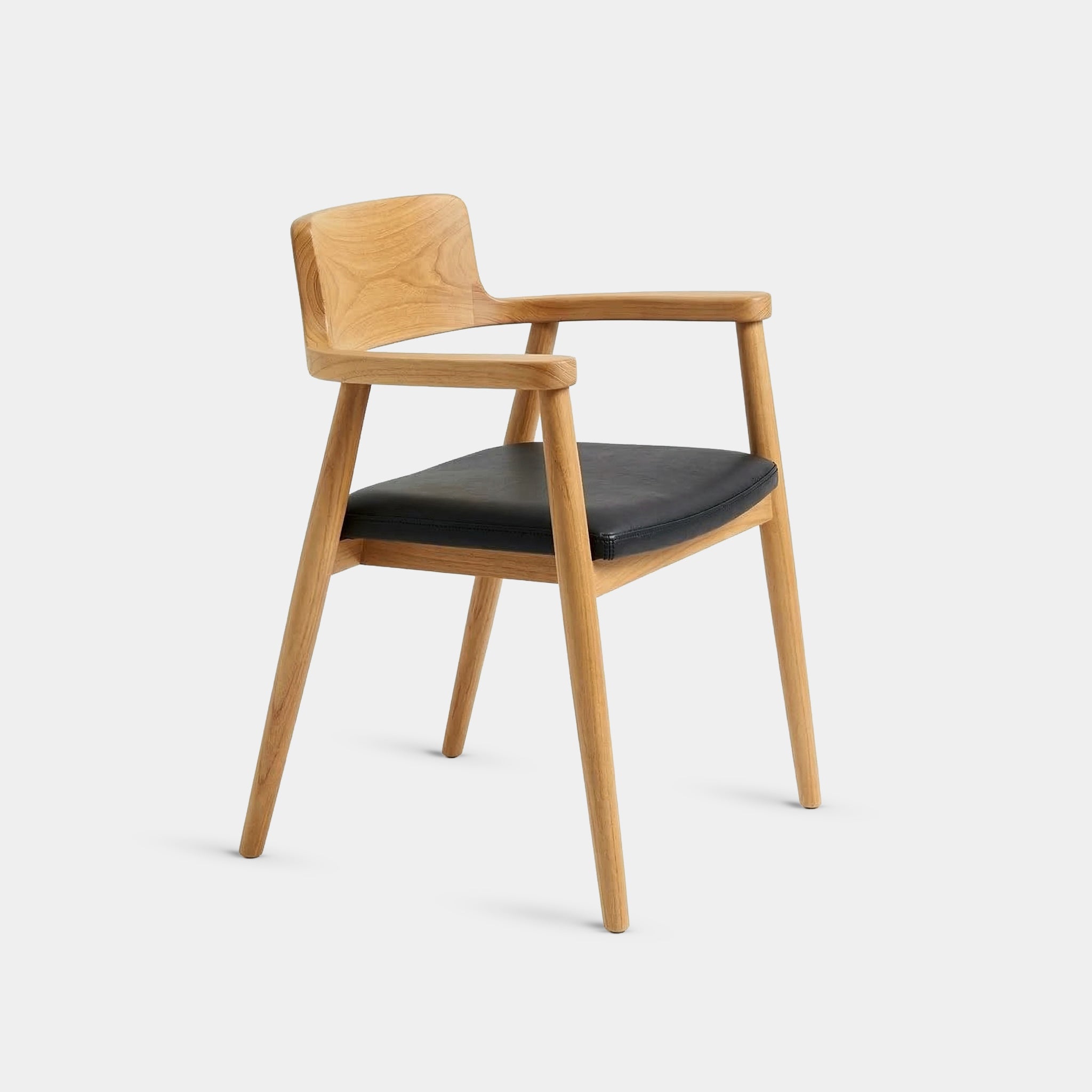 Chili Tropical Japandi dining chair with wrap-around backrest and black upholstered seat, handcrafted in Chiang Mai from 100% reclaimed old teak.