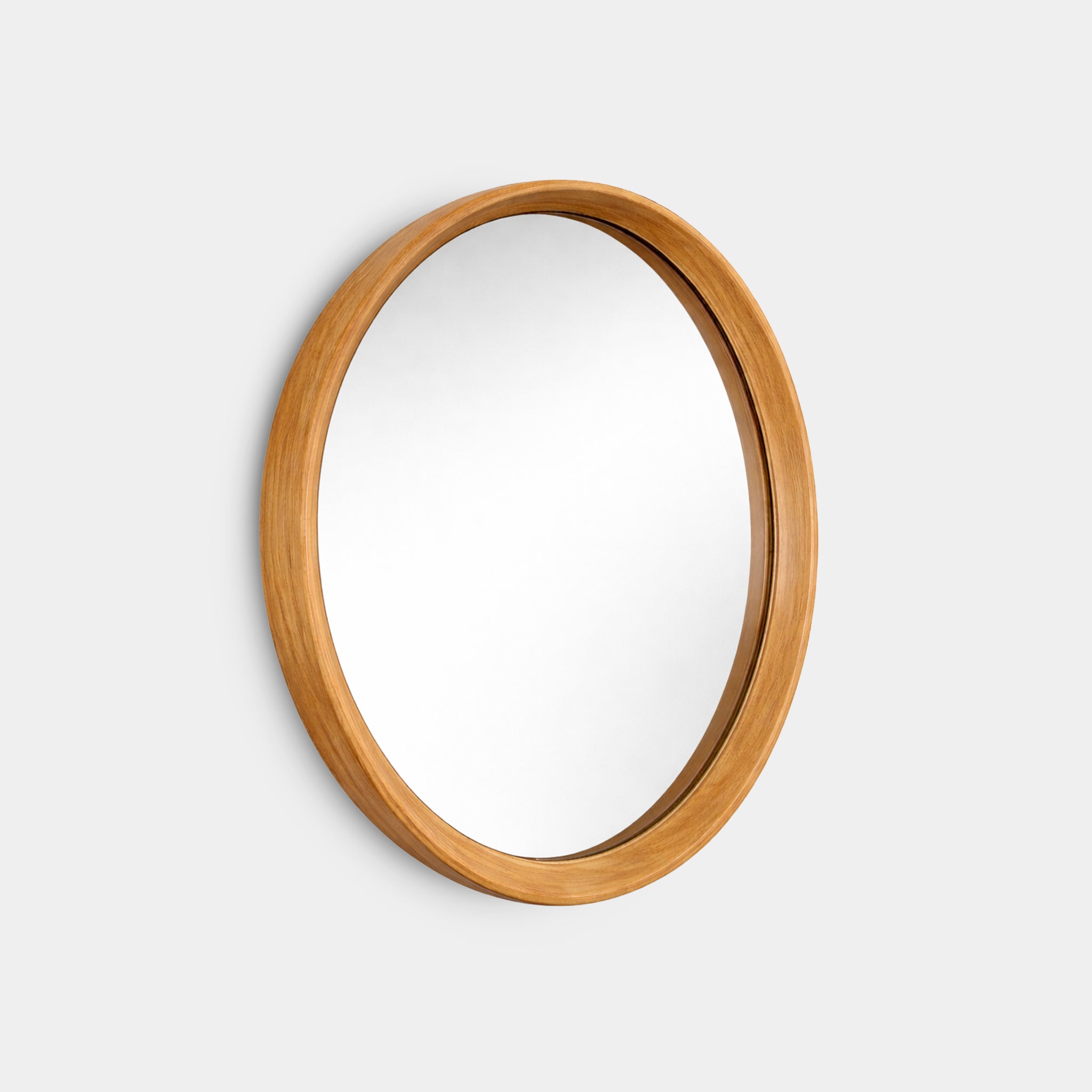 Dara 100% reclaimed teak round wall mirror with deep solid wood frame, handcrafted in Chiang Mai, Thailand.