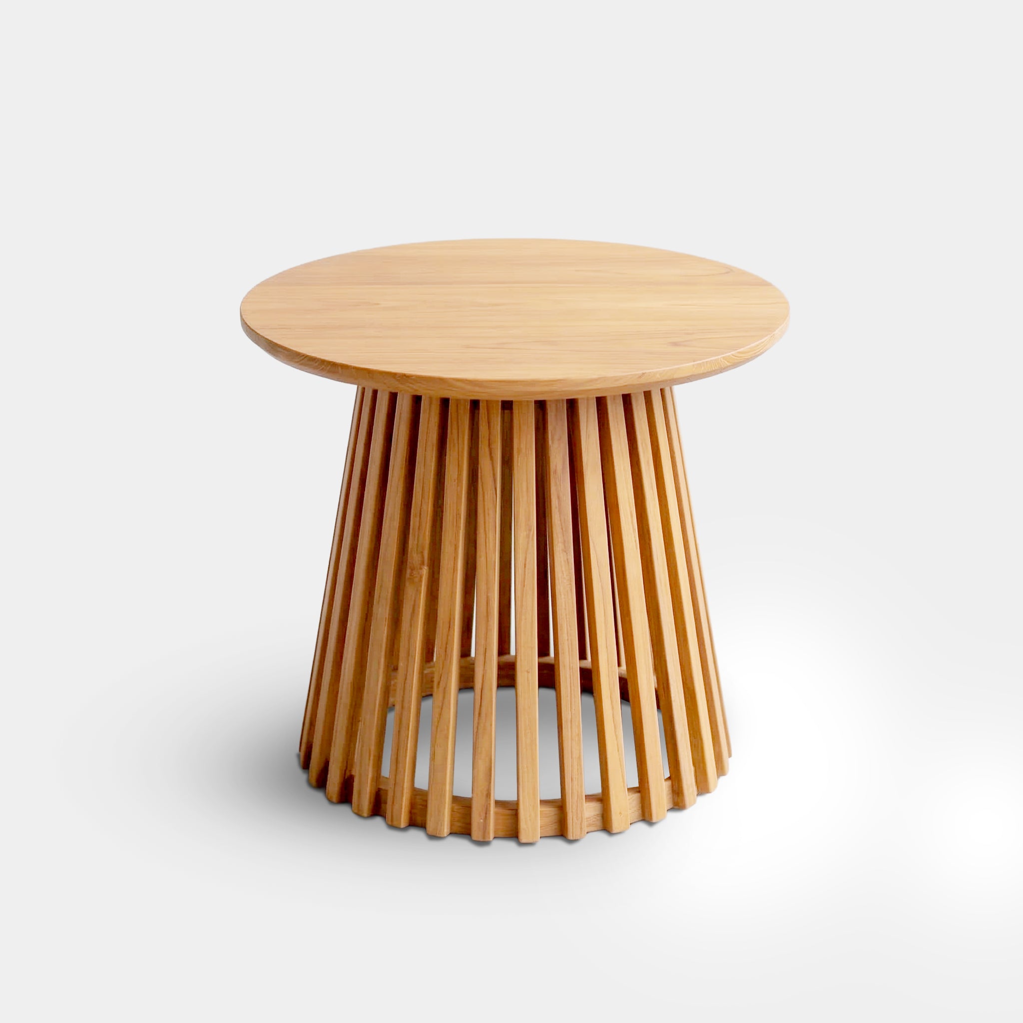 Maya round coffee table with a conical slatted base, handcrafted from 100% reclaimed old teak in Chiang Mai, Thailand.