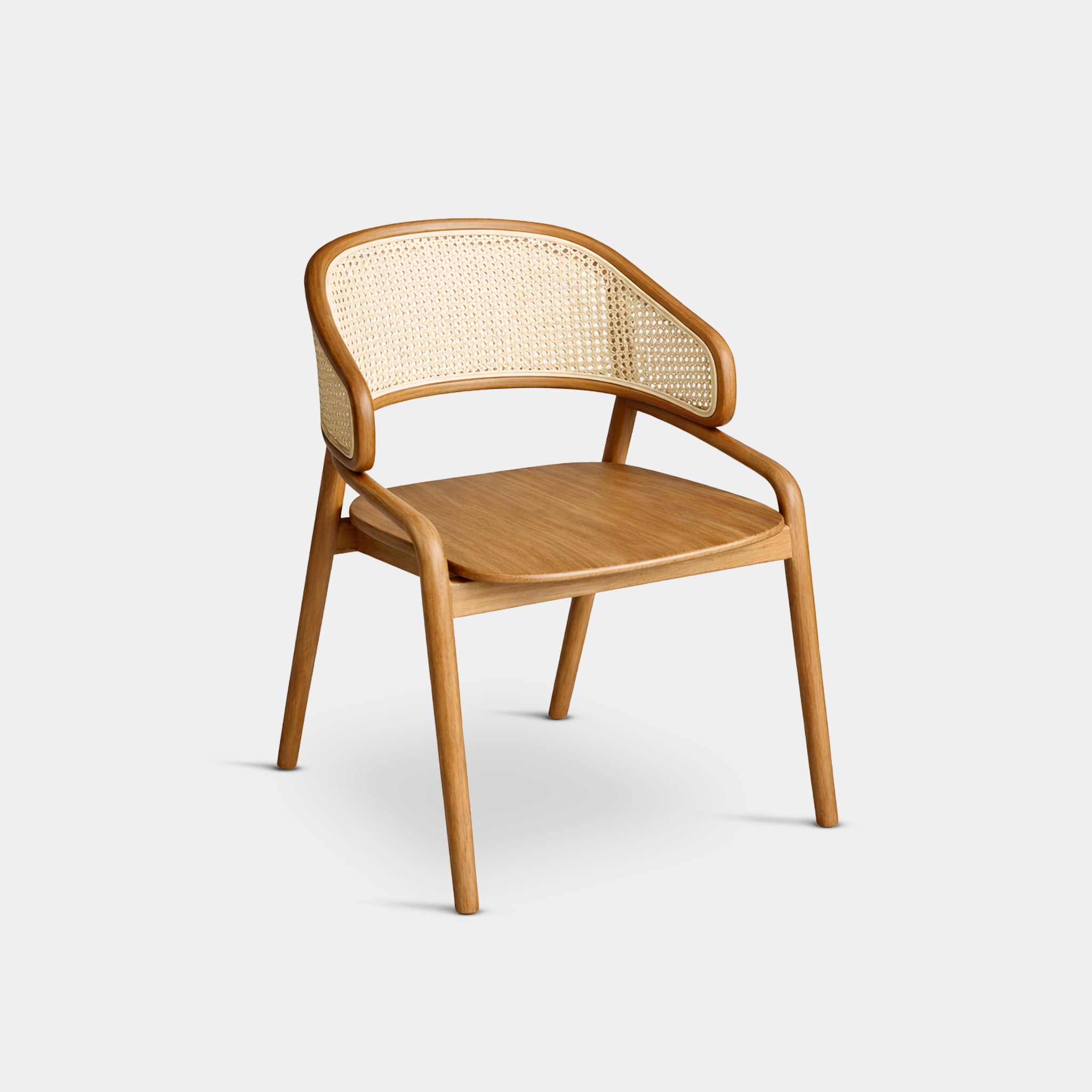 Lanta Tropical Japandi dining chair with curved backrest and woven cord seat, handcrafted from 100% reclaimed old teak in Chiang Mai, Thailand.