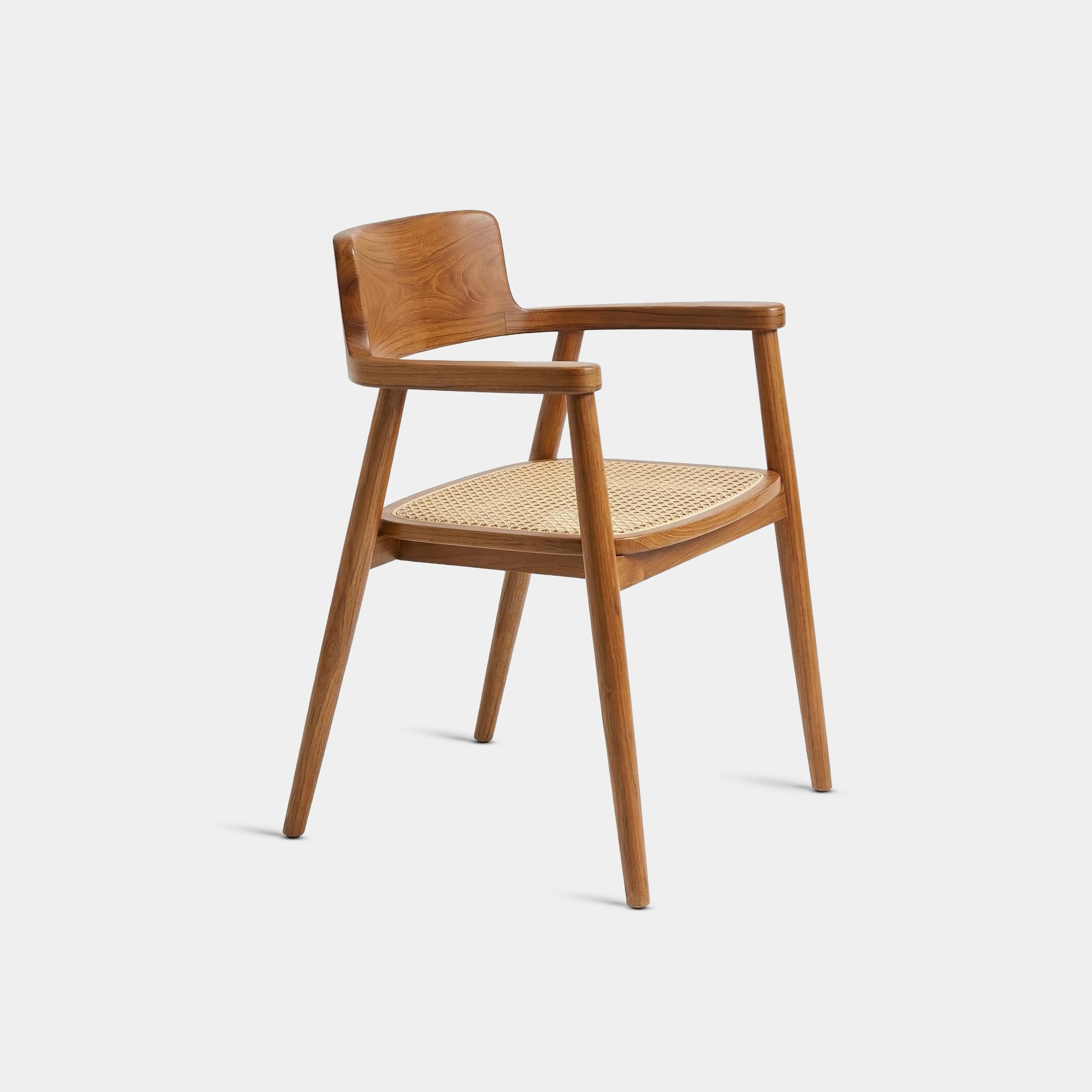 Mint Tropical Japandi dining chair with natural rattan seat and lumbar support, handcrafted from 100% reclaimed old teak in Chiang Mai, Thailand.