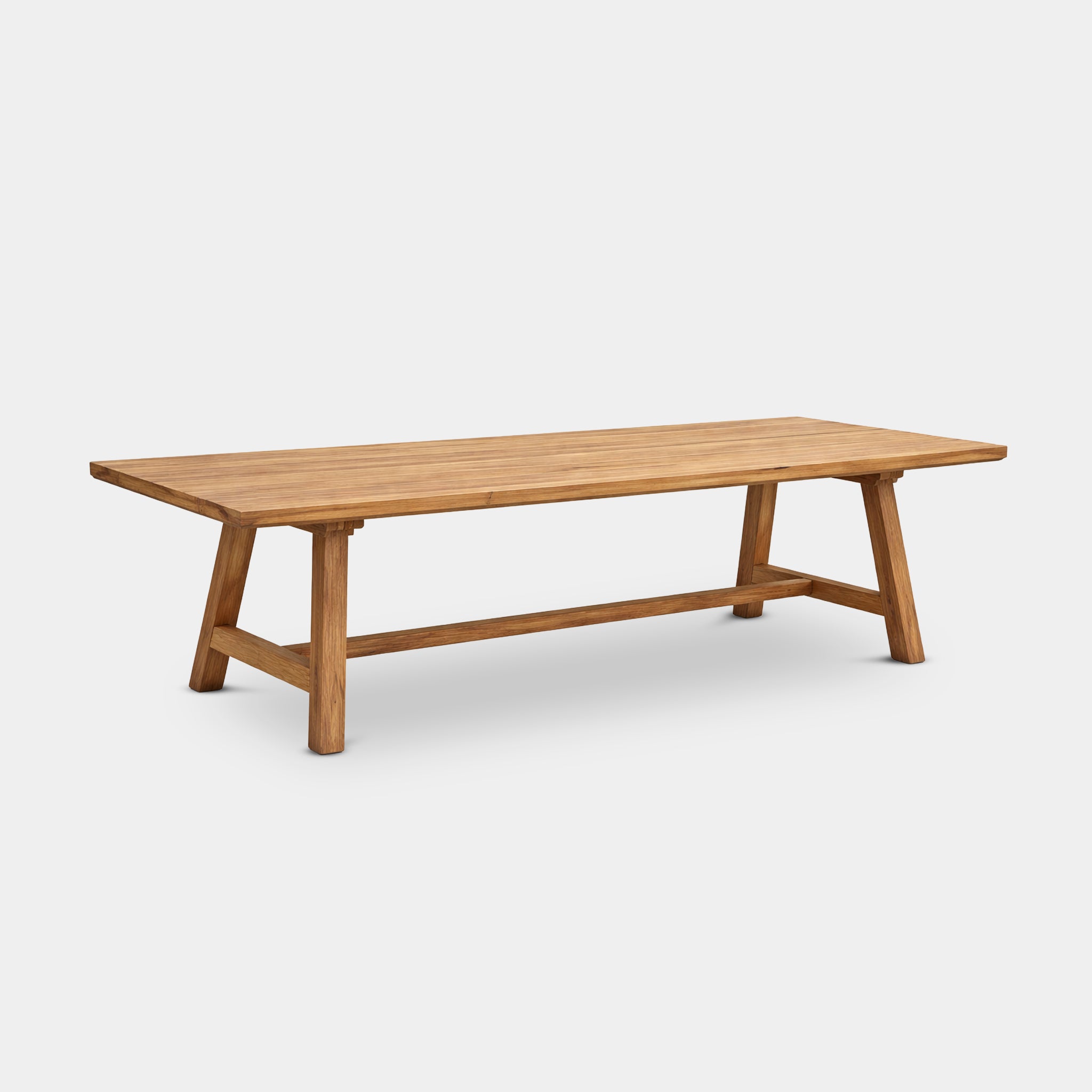 Tao rectangular dining table with angled legs and support beam, handcrafted from 100% reclaimed old teak in Chiang Mai, Thailand.